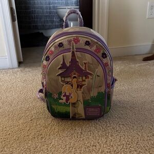 Loungefly Purple and Green Disney Backpack